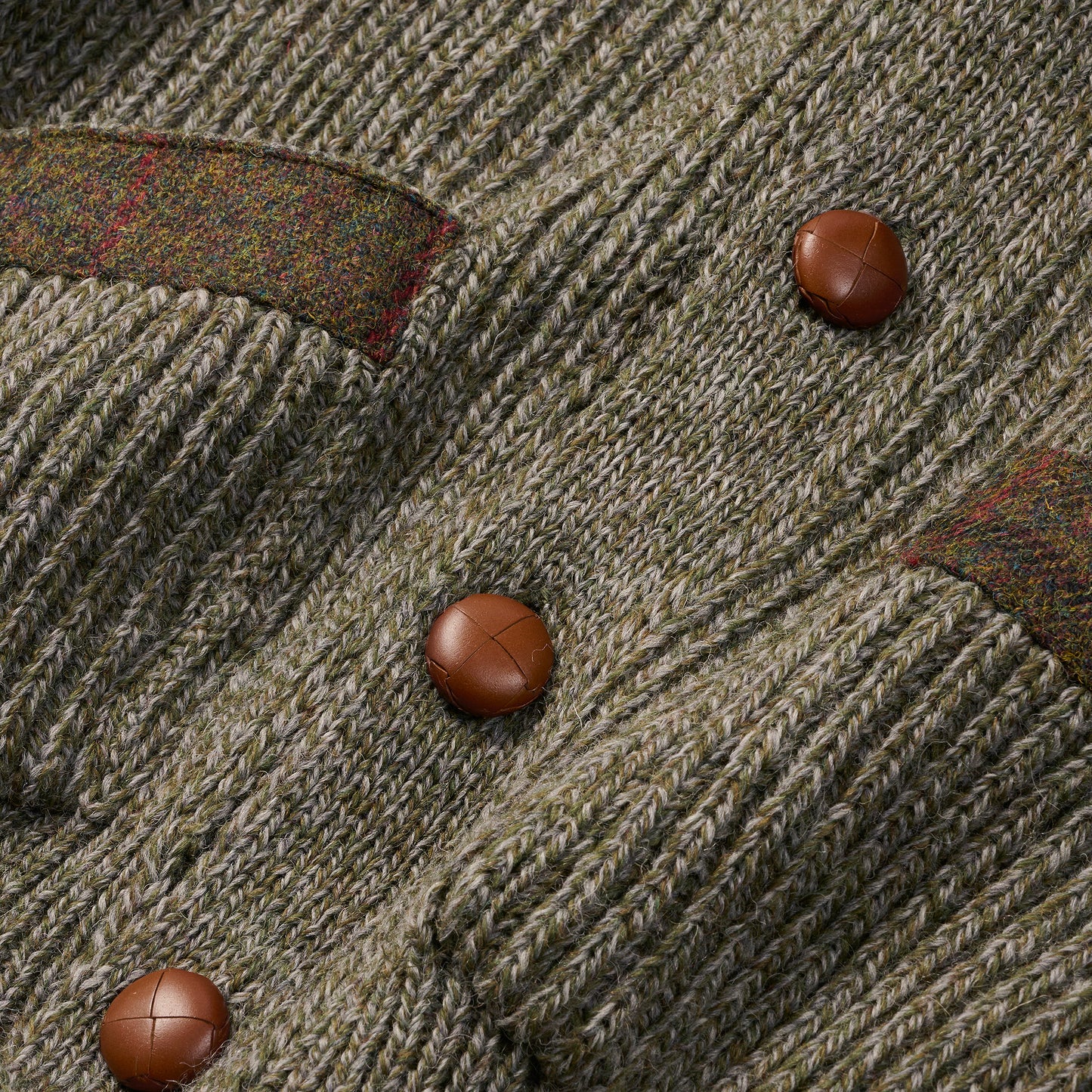 
                  
                    Chunky Wool Cardigan with Harris Tweed patches
                  
                